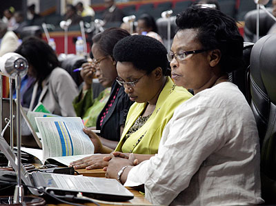 MPs read through the 2013 Ombudsmanu2019s report on November 13 .The New Times/ File.