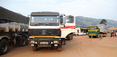 Cargo trucks wait for clearance at Gatuna border. Having similar trade laws across the major trade blocs would be a big step towards elimination of barriers to business. The New Times / File