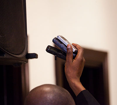 A journalist  recording proceedings during a media dialogue on November 12, 2013 in Kigali.  The New Times  /T.Kisambira.