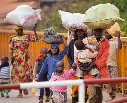  Rwandans evicted from Tanzania arrive at Rusumo border post in August. The New Times/ File.