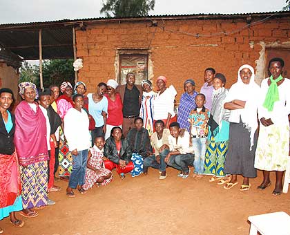 Members of Best Hope, an association which supports Genocide rape victims, pose for a photo with some of the beneficiaries last week. The New Times / Kim Harrisberg.