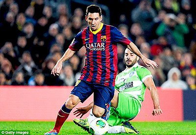 Messi skips past Getafe's Mehdi Lacen as he caps off his comeback with a brace. Net photo.