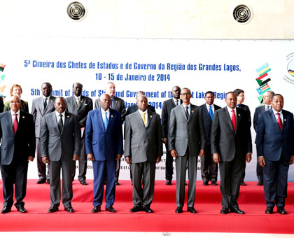 Front row from L-R: Presidents Jacob Zuma (S. Africa), Joseph Kabila (DRC), Eduardo dos Santos (Angola), Yoweri Museveni (Uganda), Paul Kagame and Uhuru Kenyatta (Kenya) at the ICGLR Summit in Luanda yesterday. The New Times/Village Urugwiro