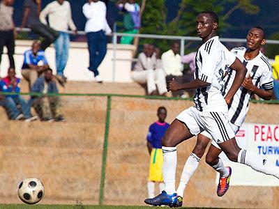 Both Andrew Buteera, front, and Jean-Baptiste Mugiraneza, in background, were on target for the league leaders. Sunday Sport/File