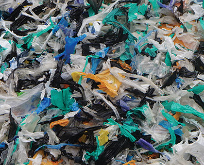 Waste polythene paper that is used to make sheeting (inset) for construction and other uses. Though the recycling industry is small, it is growing steadily and attracting more investors. Courtesy photo.