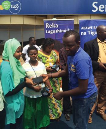 Some of the winners receive their prizes at Tigo head office recently. The New Times / Ben Gasore