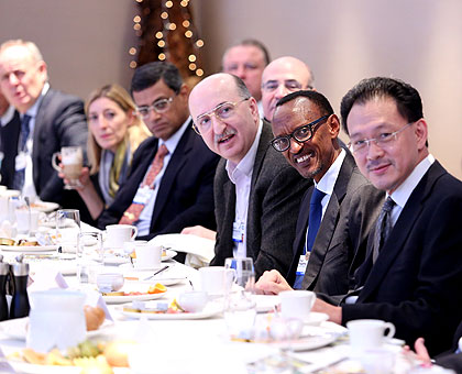 President Kagame has a light moment at the Business Leaders Breakfast in Davos yesterday. The New Times/Village Urugwiro