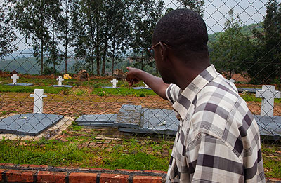 Innocent Kamanzi, 45, points at the place where he suspects his relatives were buried in Ngororero District, Western province. The New Times/Timothy Kisambira.