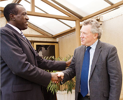 Senate president Dr Jean Damascene Ntawukuriryayo (L), receives Michael Ryan, the Head of European Union Delegation to Rwanda, at the Senate yesterday. The New Times/ T.Kisambira.