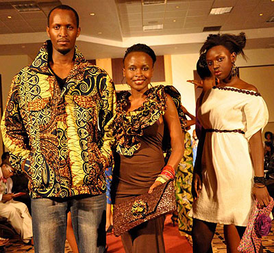 Joselyne Umutoniwase (centre) at one of the fashion shows organised by Rwanda clothing. The New Times / File.