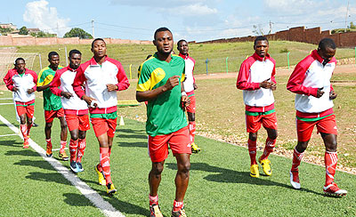 Former Amavubi striker Saidi Abdi (front) leads his teammates in a pre-match warm-up session before a previous league game. Espoir are third in the league. Samuel Ngendahimana.