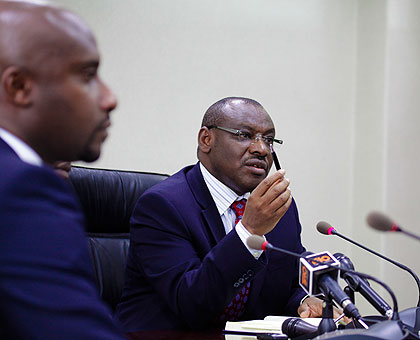 Finance minister Amb. Claver Gatete (R) together with Celestine Rwabukumba, Chief Executive, Rwanda Stock Exchange, at the news briefing yesterday.Timothy Kisambira.  