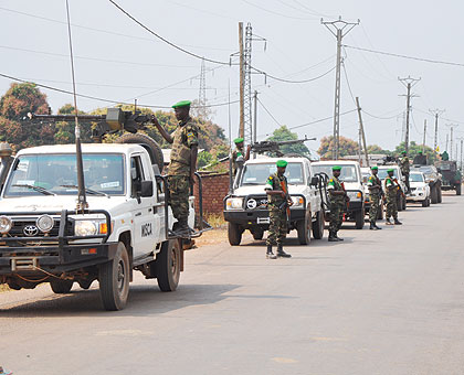 RDF patrols one of the streets in CAR.  The Rwandan peacekeepers rescued nearly 2,000 fleeing Muslim civilians who came under attack from the marauding mainly Christian anti-balaka....