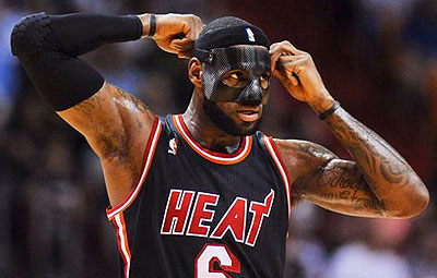 Miami Heat small forward LeBron James (6) puts on his protective mask. Net Photo