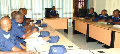 Munyuza (C) briefs Police officers during the peacekeeping pre-deployment exercise in Kigali yesterday. Courtesy.