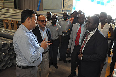 Eng. Kabirizi, (in a black suit, right) the director of water development in Ugandau2019s Ministry of Water launched the plant on Friday.  Courtesy.