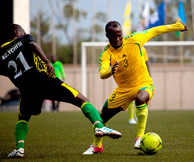 Left-back Mwemere Ngirinshuti, right, seen playing against Academie Tchite in the Caf Cup, has been one of the key players for AS Kigali this season. Timothy Kisambira