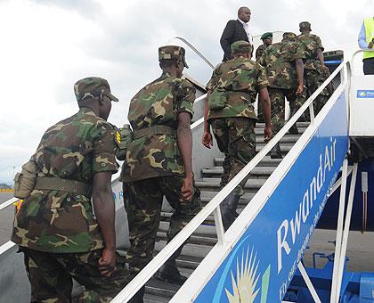 Rwandan Peacekeepers board plane headed for Darfur. (File)