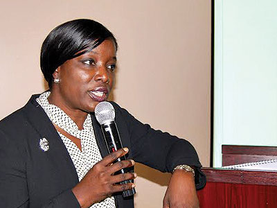 Adelekan addresses bankers and other financial sector stakeholders at Lemigo Hotel in Kigali. (Peterson Tumwebaze)