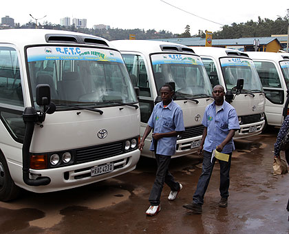 New fleet of buses owned by Rwanda Federation of Transport Cooperatives in Nyabugogo Park on Tuesday. (John Mbanda)