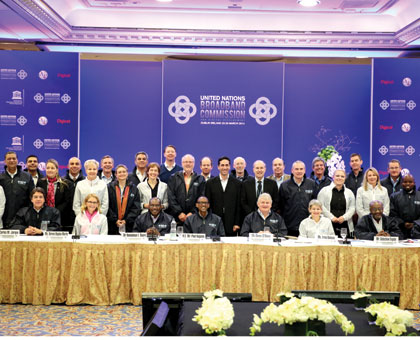 President Kagame poses for a picture with Mr. Carlos Jarque, Representing Mr. Carlos Slim, co-chair of the Broadband Commission;Ms. Irina Bokova, co-Vice-Chair of the Broadband ....