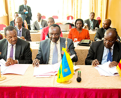 Trade and Industry minister Franu00e7ois Kanimba (C), Ugandau2019s state minister of Internal Affairs James Baba (R), and Joseph WN Nyagah, the national coordinator Norther....