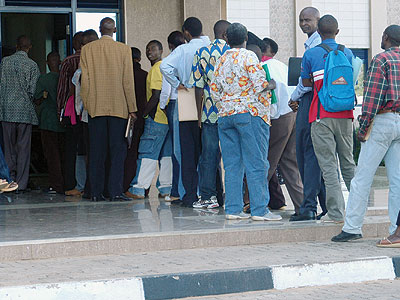 People line up at a bank. Organisations need to act on clientsu2019 feedback immediately to stay competitive. (File)