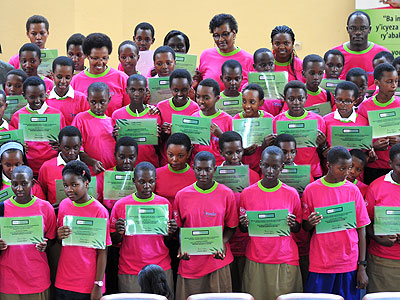 Some of the school girls who were awarded for good performance at an event held in Kigali last weekend. (Courtesy)