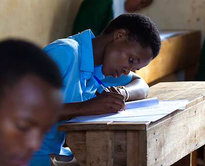 Students in Rwamagana District sit an exam. Up to 68 per cent of the population can read and write. (Timothy Kisambira)