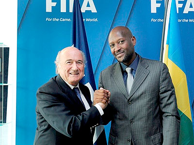 Fifa president Joseph Blatter (left) meets Ferwafa chief, Vincent Nzamwita, in Zurich, Switzerland on Sunday. (Courtesy)