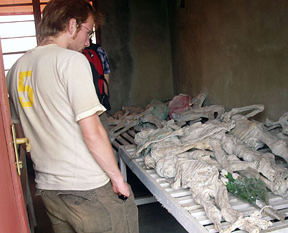 An unidentified visitor to Murambi Gencide Memorial Centre views remains of the victims. (File)