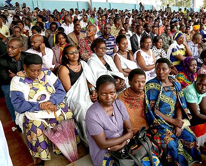 Residents listen to speeches during the ceremony to receive Kwibuka Flame at IPRC - Kigali, former ETO Kicukiro. (Courtesy)