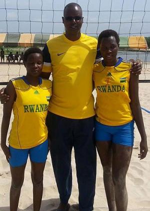 Coach Paul Bitok with his girls' team of Seraphine Mukantambara and Lea Uwimbabazi in Ghana. File