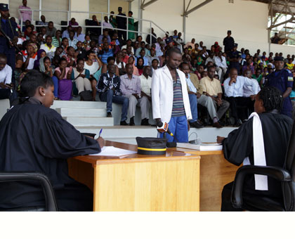 Sylvestre Hora, a former house-help charged with murder for the killing of Shalom u2018Bellau2019 Uwase, last month, appears before a public hearing by Nyarugenge Intermediate Court si....