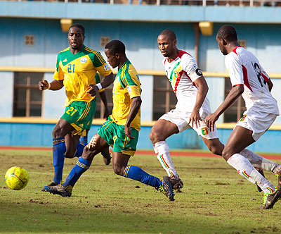 Amavubi Stars captain Haruna Niyonzima, seen here in action against Mali during a 2014 Fifa World Cup qualifier, will lead the team against Botswana on May 10. File.