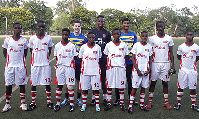 Airtel Rwanda team and the two tutelage coaches from Arsenal Academy, Rupen Shah and Nathan Asare, standing behind. Courtesy.