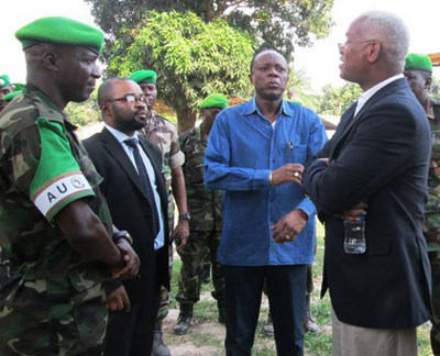 Gen. Jean-Marie Michel Mokoko (in blue shirt), AU Peace and Security Department Director Elghassim Wane, together with Rwandan Contingent Commander in Misca, Lt. Col. JP Karangwa c....