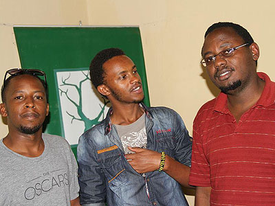 Manishimwe (R) his colleague Richmond (L) and their camera man. (Moses Opobo)