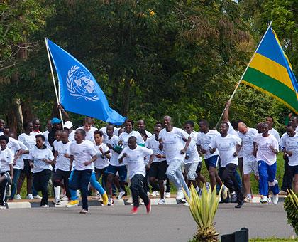 Journalists being flagged for the marathon. (Timothy Kisambira)