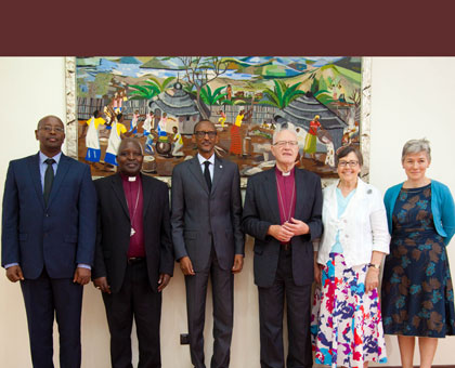 President Kagame  (C) poses in a group photo with retired Archbishop of Canterbury George Carey (3rd right), the bishopu2019s wife Lady Illeen Carey, Henrietta Blyth, Rwandau2019s Angl....