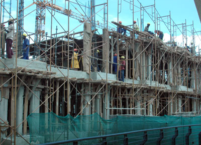 Workers at a construction site in Kigali. The country is widely recognised for its dramatic recovery from one of the most vicious genocides the world has ever seen. File.