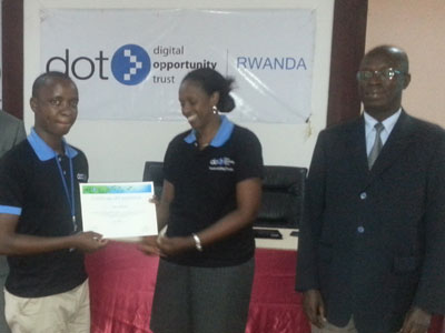 A graduate (left) receives a certificate from DOT country director Violette Uwamutara. On the right is Murekezi. (Courtesy)