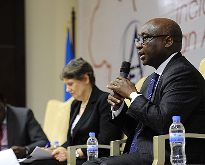 Dr Kaberuka (R) speaks at the African Economic Conference in Kigali in 2012. (File)