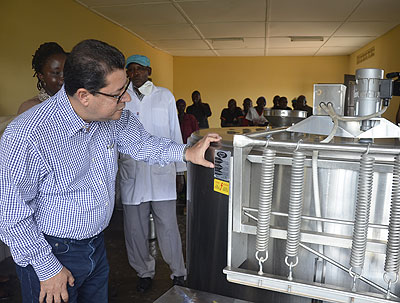 AfDB vice-president Aly Abou-Sabaa, inspects equipment of Rugobagoba Milk Collection Centre over the weekend . Hyppolite Ntigurirwa.