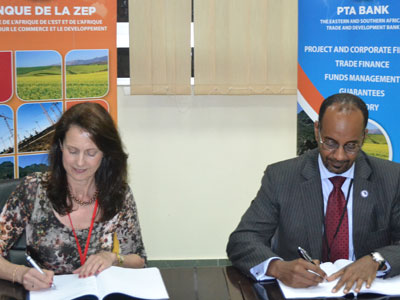 Admassu Tadesse, PTA Bank's CEO (R) and Sylvia Sedlacek, KfW IPEX-Bank's Financial Institutions Vice President, signing the agreement. (Courtesy)