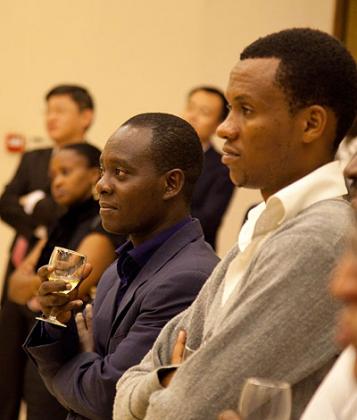 Some of the Rwandan students who studied in China listen to a presentation during the chinese New Year celebrations at the embassy this year.  File.   