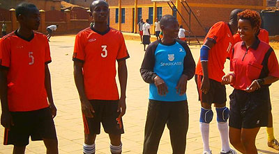 Gisele Kazuwitonze, right, inspects the teams before a menu2019s league game last season. File Photo