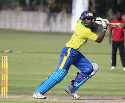 Eric Dusingizimana, seen in action for the national team during a past game, scored a record 101 runs in a T20 game. Courtesy