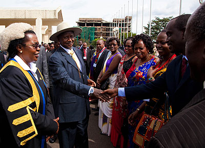 EALA Speaker margaret Zziwa introduces legislators to Ugandau2019s President Yoweri Museveni in a past event at the Parliament in Rwanda. Courtesy.