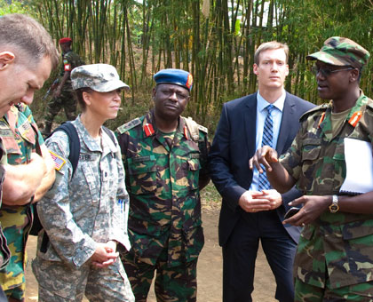 Army spokesperson Brig. Gen. Joseph Nzabamwita (R) speaks to some military attaches at the Rwanda DR Congo border in Rubavu following Congo's shelling of Rwandan territory last year. (Timothy Kisambira)